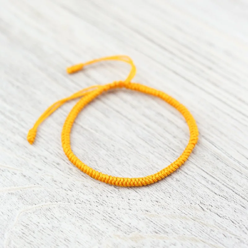 Women’s infinity bangle-Tibetan Traditions Yellow Knotted Bracelet