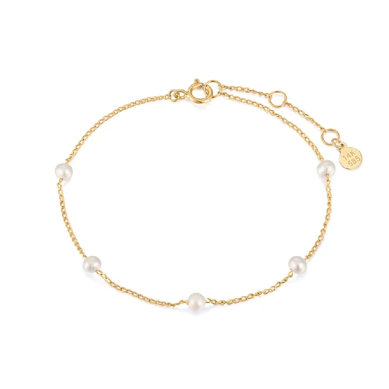 Women’s luxury tennis bracelet-14K Yellow Gold Pearl Station Bracelet by Aurelie Gi